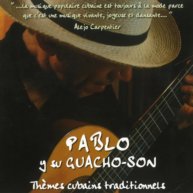 Pochette du disque « Pablo y su Guacho-Son », Thèmes cubains traditionnels : Pablo Lopez-Nussa en chapeau de paille, penché sur sa guitare